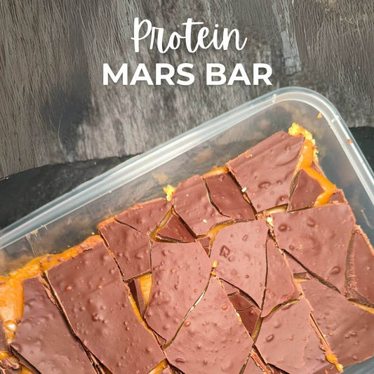 photo of a box of protein bars on slate and text about that says protein mars bar